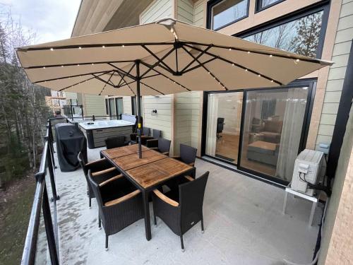 Ski Condo & Spa - L'Elegance Des Sommets in เธทฟอร์ด มีเน (ควิเบก)