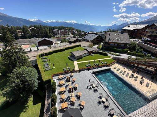 景觀, Vue panoramique, Piscine, Spa, Ski in-out & Golf à l'hôtel de l'Etrier à Crans-Montana (Vue panoramique, Piscine, Spa, Ski in-out & Golf a l'hotel de l'Etrier a Crans-Montana) in 克蘭斯蒙塔納