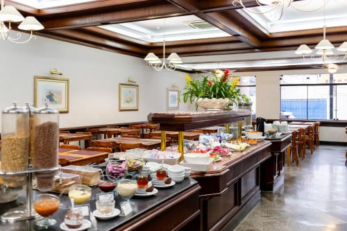 ห้องอาหาร, Hotel Carlton Plaza in ปอสซอสเดกาลเดส