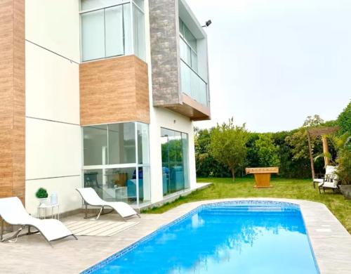 Paraíso Familiar en Asia - Juegos y Piscina