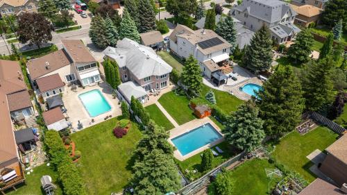 Spacious Home with Heated Pool and large Backyard
