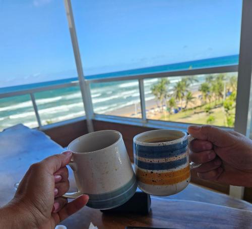 Frente Mar Pe Na Areia Familia