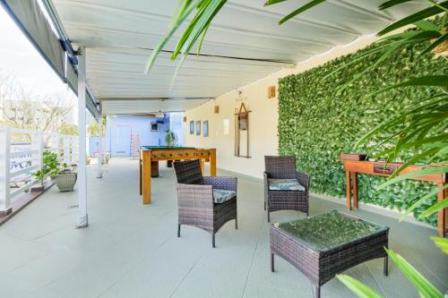 zonă comună salon/TV, Velinn Pousada Remanso do Mar in Ubatuba