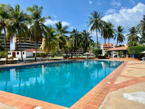 Swimming pool, Tu descanso a escaso pasos de la Playa in Puerto La Cruz
