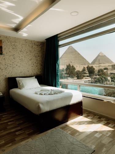 Turquoise Pyramids & Grand Egyptian museum view Hotel Room Type - Deluxe Twin Room