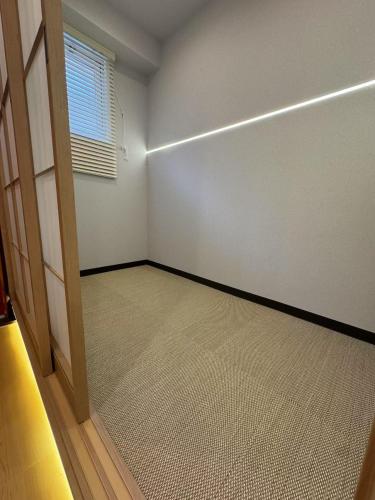 Minshuku 203 under the clear sky 8-minute walk from Kinshicho Station direct line to Narita Airport 50-minute walk from Disneyland and 1-minute walk from the mall