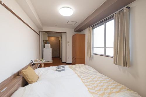 Clear Sky Guesthouse 305 Direct to Narita Airport, 8-minute walk from Kinshicho Station, within walking distance of Asakusa and Clear Sky Tower, 50 minutes to Disneyland, 1 minute to the mall