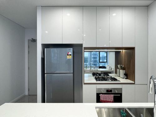 kuhinja, Quiet & Practical 2BR Apartment in Zetland