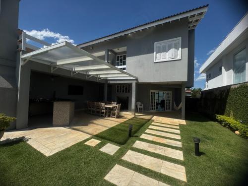Casa pet friendly Guarujá condomínio Jardim Acapulco (Casa pet friendly Guaruja condominio Jardim Acapulco) in 雅爾丁阿卡普爾科