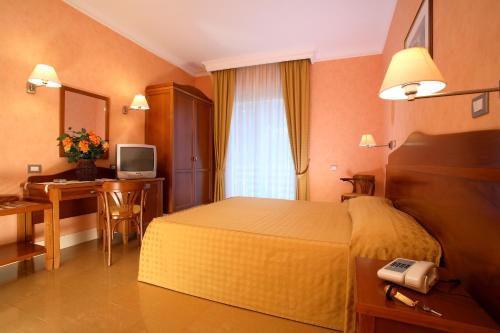 Hotel Conchiglia dOro Stop at Hotel Conchiglia dOro to discover the wonders of Mondello. The hotel has everything you need for a comfortable stay. 24-hour front desk, room service, meeting facilities, restaurant, elevator