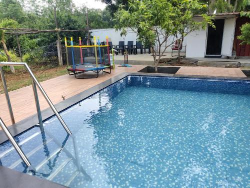 Sivarama garden resort,7 BHK swimming pools&Box cricket night play & AC, kichan with all equipment,near bheemili beach road , vishakhapatnam