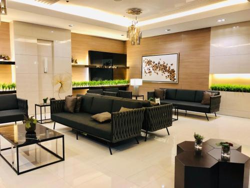 Relaxing 1Br in Quezon City, garden view with pool & mall, Manila