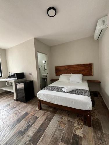 Hotel 15 Avenida - Tap to explore photos