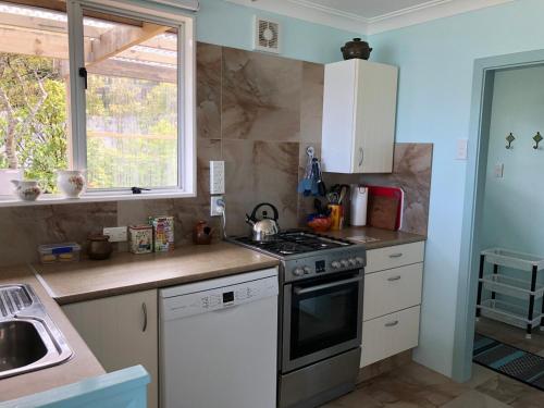 Butterfield Beach House Stewart Island incl car in เกาะสเตวาร์ท