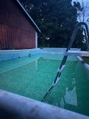 Úszómedence, Ferienwohnung am Komisenpad in Sudlohn