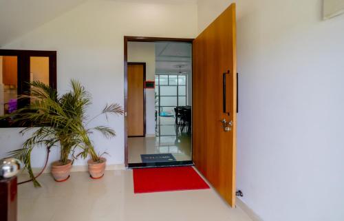 Közös társalgó / TV, Nyra Homestay | 3bhk Villa with Pool. in Pachar
