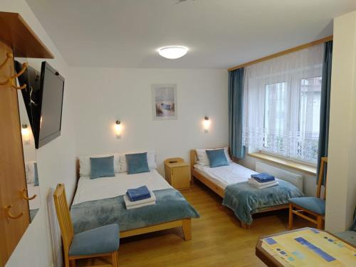 Pokoje i Apartamenty Ara Karwia