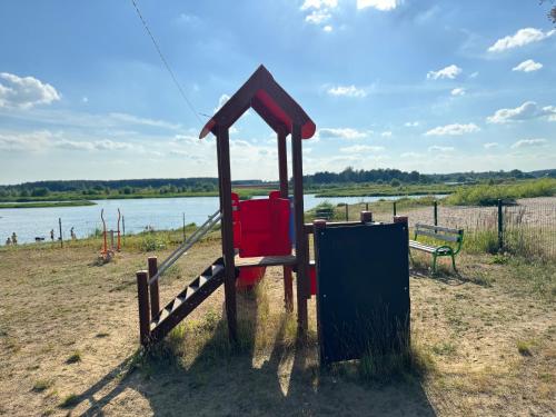 Wakacyjny domek - Łaś Ogrody (Wakacyjny domek - Las Ogrody) in Szelkow