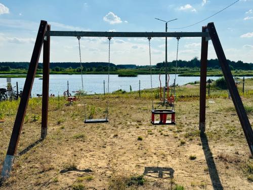 Wakacyjny domek - Łaś Ogrody (Wakacyjny domek - Las Ogrody) in Szelkow