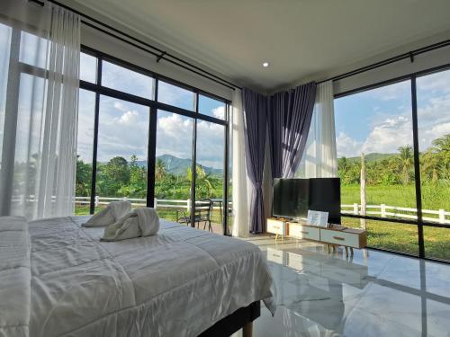 Bed, บ้านพักมิตรภาพโฮมสเตย์ อำเภอปัว จังหวัดน่าน in Pua