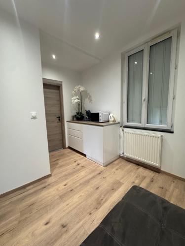 مطبخ, Comme à la maison - Chambre et salle de bain privée & petit déjeuner (Comme a la maison - Chambre et salle de bain privee & petit dejeuner) in Poligny