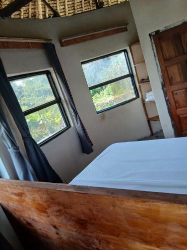 Tiny house, kitchen downstairs in Shimoni