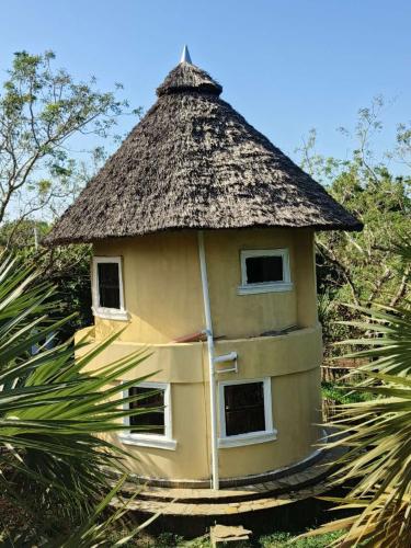 Tiny house, kitchen downstairs in Shimoni