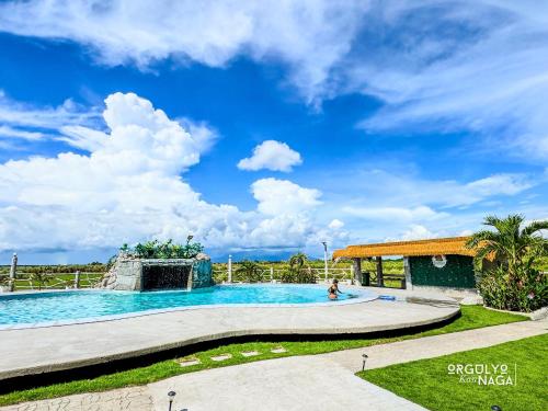 THE OASIS RESORT CondoBimbo 1-Big Room, Balcony, kitchen, Pool, Wifi, Videoke