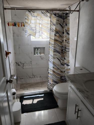 Shower, Cosy Corner under the Hill in St. Philip