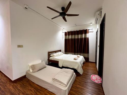 Est 25 by Agel Homestay, Penampang (фото 3)
