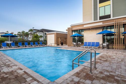 Zwembad, Hilton Garden Inn Cape Canaveral near Cocoa Beach in Cape Canaveral