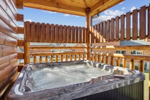 PF Plunge 4 Bedroom Cabin Private Indoor Pool Game Room Hot Tub Prime Location in Pigeon Forge, USA