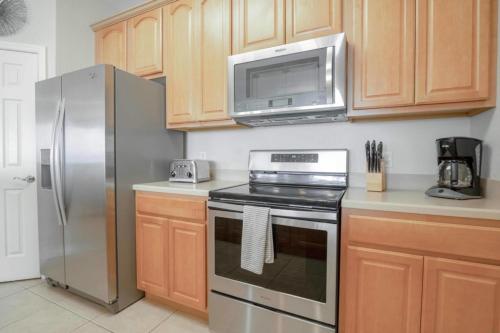 New! Spectacular Vista Cay Penthouse Prize Near Theme Parks Walk to Conventions and Intl Drive in Orlando, USA