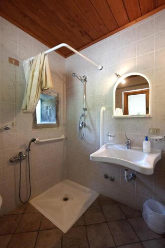 淋浴間, Agriturismo Mulino di Culmolle in 巴努戴羅曼格那