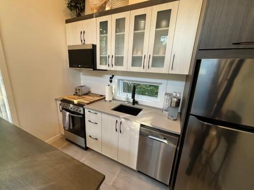 Spa - Chalet Sur Les Sentiers du Pic-Bois in เธทฟอร์ด มีเน (ควิเบก)