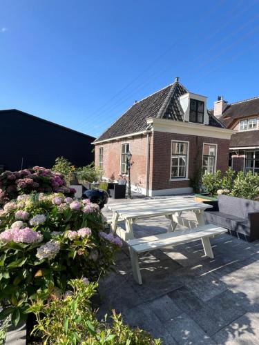 tuin, Rhynhoven Lodge in Hondsdijk