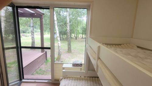 Сад, Wiosłem w Hamaku Domek nad Wkrą (Wioslem w Hamaku Domek nad Wkra) in Гліноецк