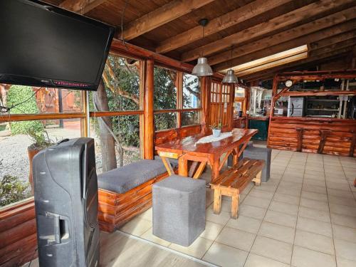 Sala de estar/TV partilhada, Refugio Aku in San Carlos de Bariloche