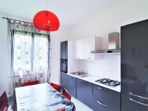virtuve, Holiday Home by Lake Maggiore with Mountain Views in Brissago Valtravaglia