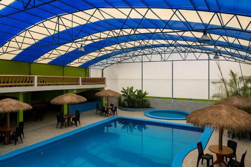 Swimming pool, Hosteria Don Poly in Salcedo