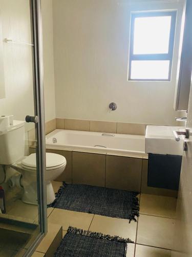 Chic, Comfy Apartment in Secure Complex, Fast WiFi, Free Parking, Sandton (fotografie 6)