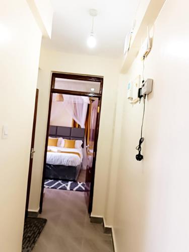 1BR With Dining Table Balcony and Free Parking in Kisumu