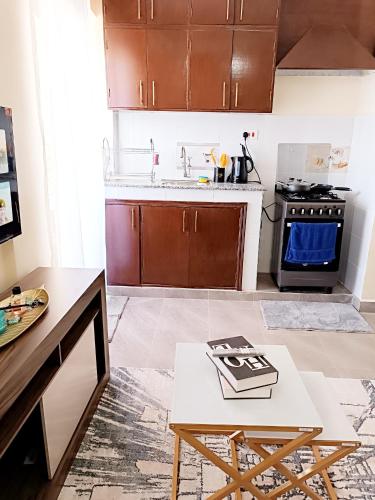 1BR With Dining Table Balcony and Free Parking in Kisumu