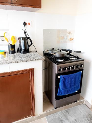1BR With Dining Table Balcony and Free Parking in Kisumu