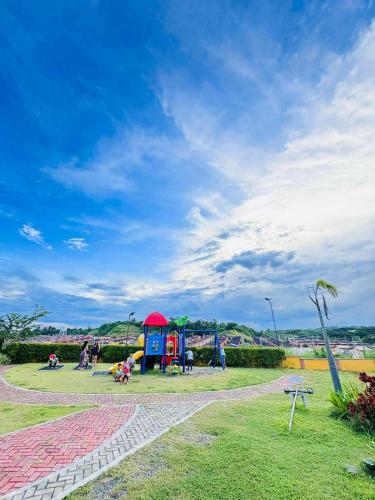Playground, Camella Homes near Airport 2 bedrooms near D'Leonor Inland Resort and Wavepool