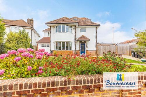 Exterior view, NEWSTEAD HOLIDAY HOME by BOURNECOAST - A Family Home with Garden, Patio, Summer House and Parking -  near Tuckton Pharmacy