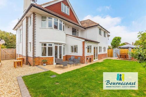 Exterior view, NEWSTEAD HOLIDAY HOME by BOURNECOAST - A Family Home with Garden, Patio, Summer House and Parking -  near Tuckton Pharmacy