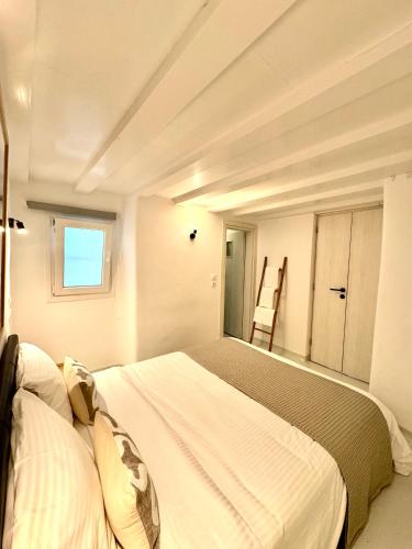 Entropia Loft Myconian Apartment - Tap to explore photos