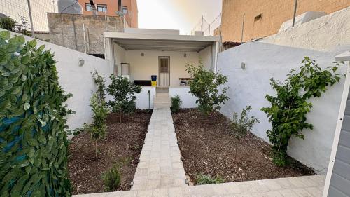 حديقة, Casa LORMA in Casa Santa