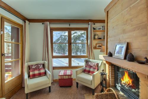 ARC 1950 - Appartement 10 personnes Duplex Cheminée - ski aux pieds - Sauna, Hammam, Jacuzzi, Piscine - Location saisonnière - Bourg-Saint-Maurice